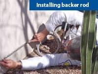 Learn More About The Desert Guard Process pest control tech installing pest control device